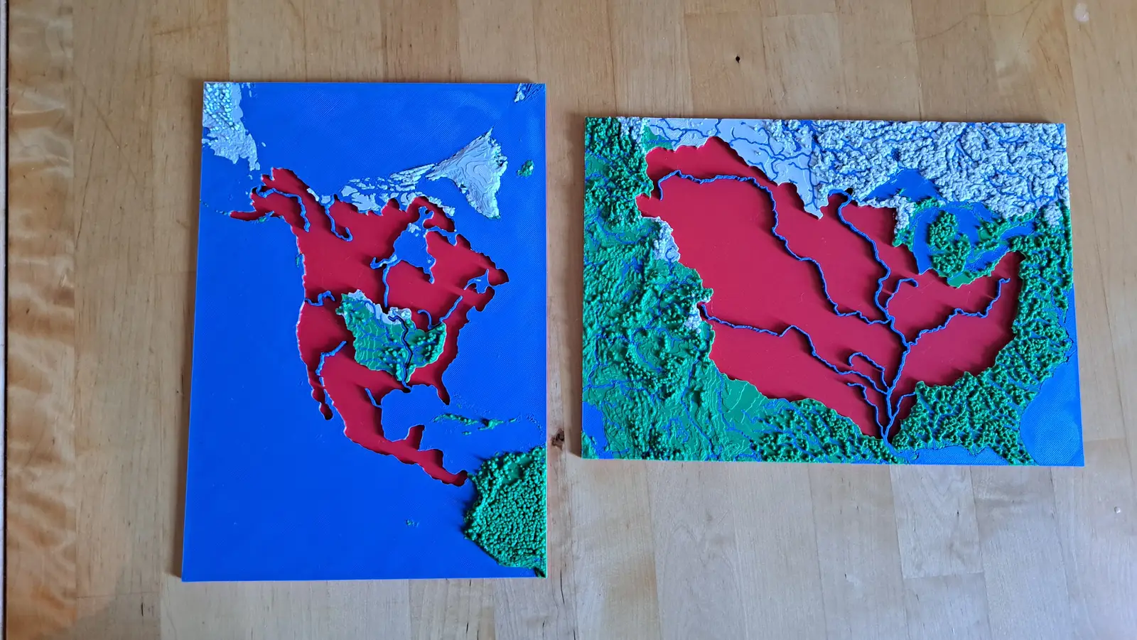 The North America plate and the Mississippi watershed plate side by side, both with their pieces removed
